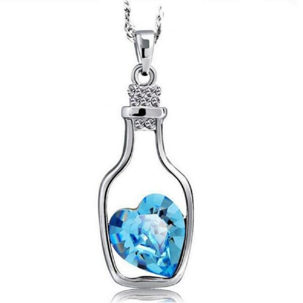 Fifth Avenue Blue Heart Crystal in Retro Bottle Silver Tone Pendant Necklace